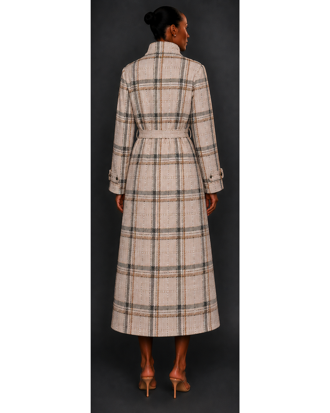 Woman wearing a plaid trench coat from behind on a plain background