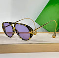 Purple tortoise shell sunglasses