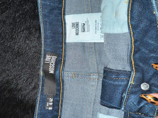Moschino Stretch Denim Shearling Skirt - The Vault by Sacha