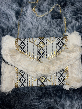 In a Clutch - The Vault by Sacha