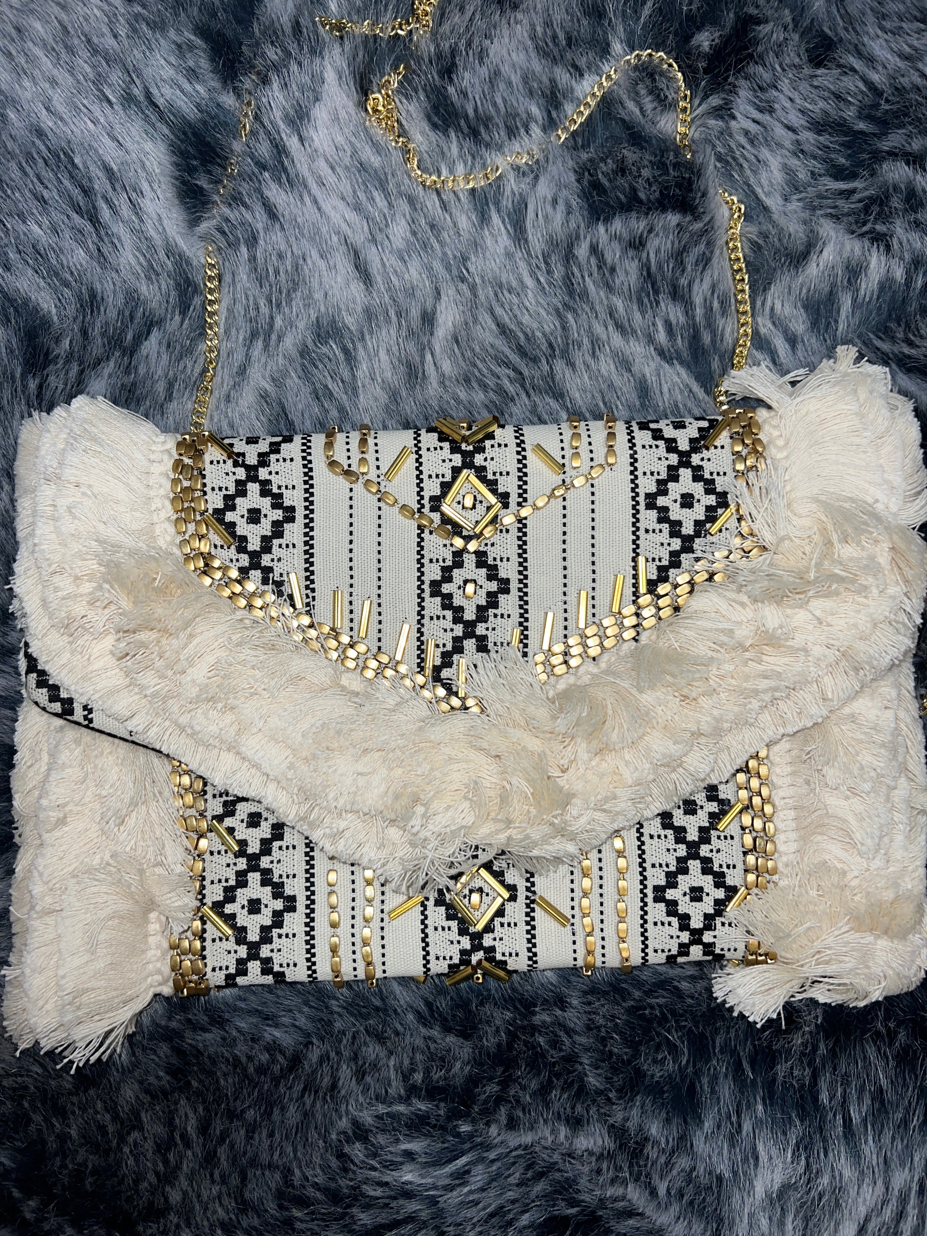 In a Clutch - The Vault by Sacha
